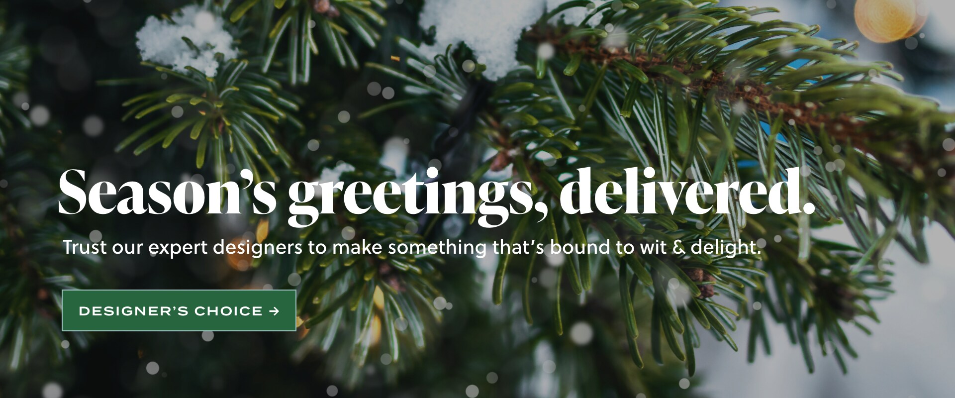 A banner linking to a Designer's Choice arrangement that says Season's Greetings delivered